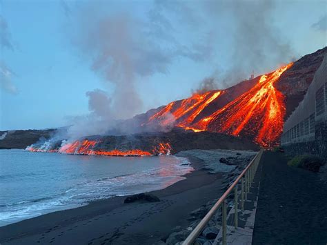 Rock rises out of the sea as second La Palma lava flow reaches ocean | Reuters