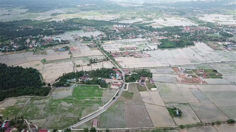 Aerial flooded rice paddy field. 9109325 Stock Video at Vecteezy