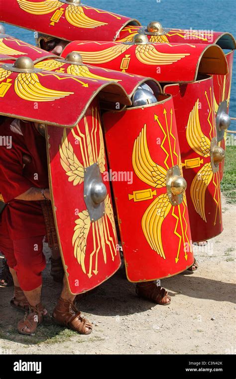 Roman Soldiers demonstrating defensive battle formation using shields ...