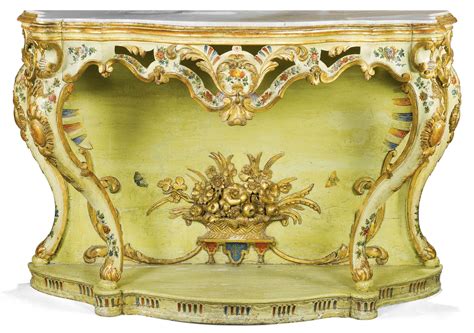 An Italian Rococo pale green and polychrome lacquered and parcel-gilt carved console table ...