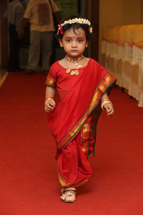 Baby girl in traditional maharashtrian nine yard saree | Kids fashion ...