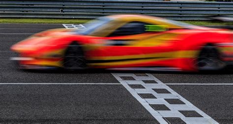 Race car Crossing the finish line, Motion blurred - East Bay WordPress ...