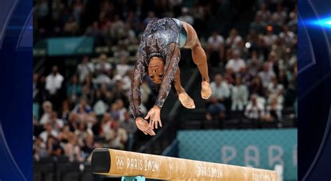 Simone Biles fights through calf injury to produce impressive ...