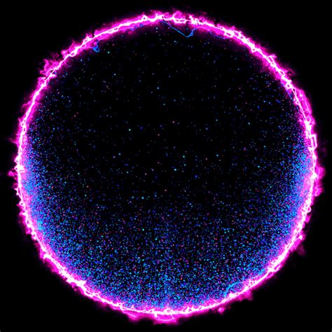 an image of the center of a circle that is filled with pink and blue lights