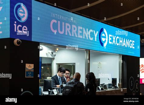 A view of a currency exchange kiosk in Shanghai Pudong International Airport Stock Photo - Alamy