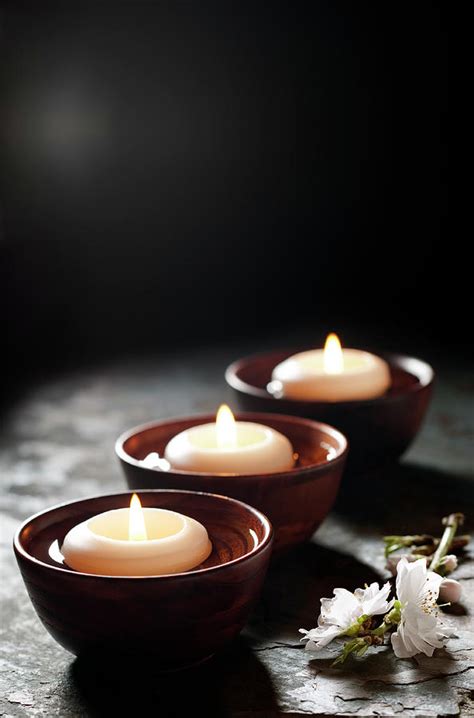 Floating Candles In A Zen Background by Nightanddayimages