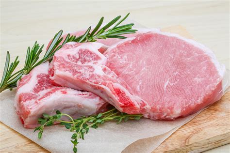 Raw pork steak 7701829 Stock Photo at Vecteezy