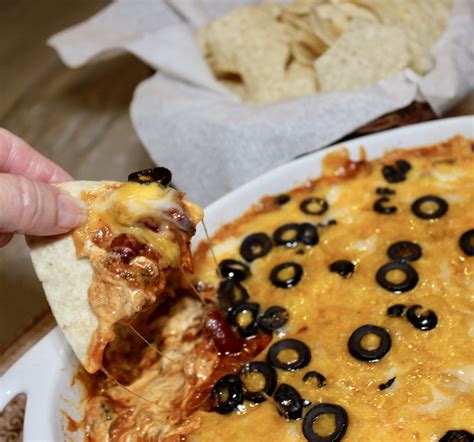 Hot Layered Mexican Dip | Recipe in 2019 | Dip for tortilla chips, Mexican dips, Refried beans