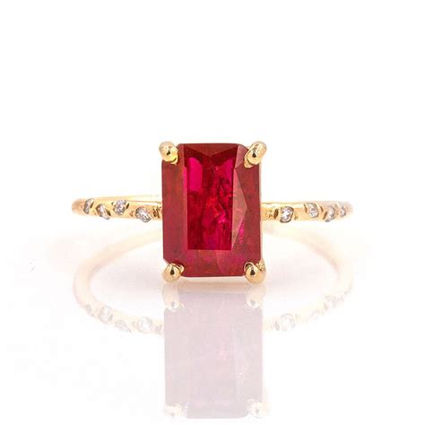 This gorgeous red Ruby takes center stage in this delicate, starry ring. A large natural earth ...