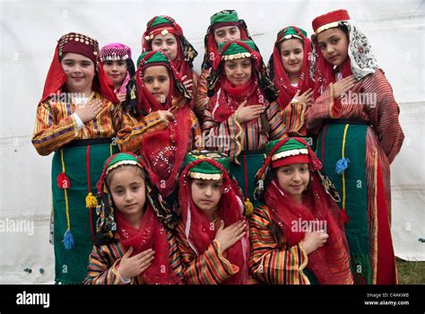 Alawite pupils within traditional folkloric dress before performing in Alawite festival/London ...