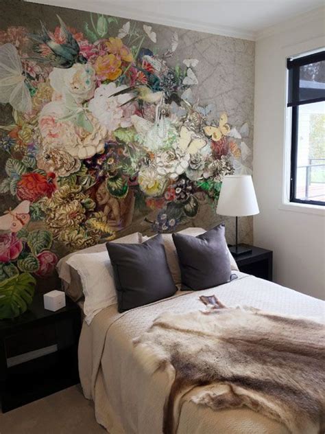 Small bedroom design featuring a dramatic still life of flowers wall mural accent wall behind ...