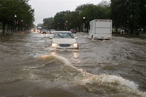 Washington Floods Expose a Double Threat: Old Drains and Climate Change - The New York Times