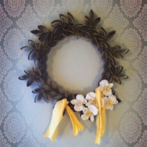 I made this wreath with toilet paper and paper towel tubes! -a