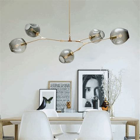 An elegant statement of eye-catching, architectural design, featuring geometric style bulb heads ...