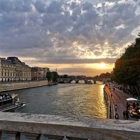 Paris by Night Small Group Bike Tour & Boat Cruise | GetYourGuide