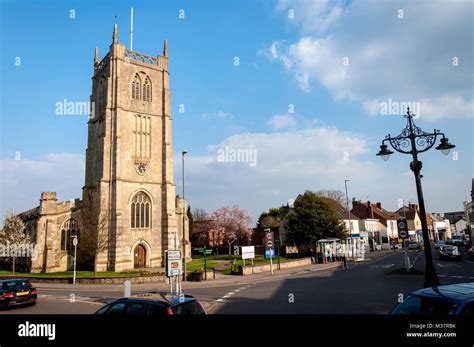 Keynsham high street and St John the Baptist church Stock Photo - Alamy