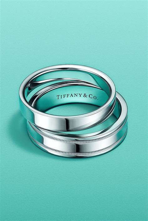 Tiffany Classic™ and Tiffany Flat band rings in platinum. | Tiffany wedding rings, Couple ring ...