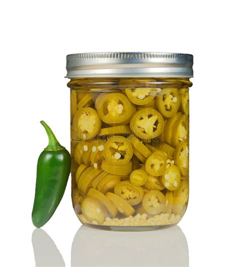 Sliced Jalapenos (Capsicum Annuum) In A Glass Jar Royalty Free Stock ...