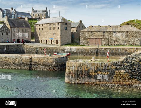 PORTSOY 17C HARBOUR AND A RED BOAT BANFFSHIRE COAST SCOTLAND Stock ...