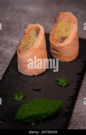 Salmon and smoked salmon ballotine recipe, watercress mash Stock Photo - Alamy