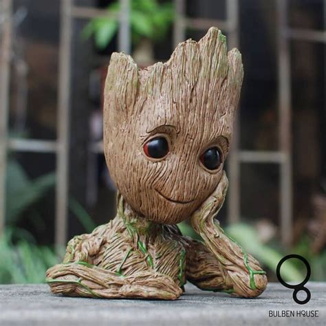 Say hi to this cute and adorable little Groot plant pot because hey Groot and plants? It makes ...