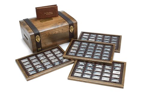 Bonhams Cars : Coffret de présentation en bois d'un ensemble de lingots en argent, intitulé Cent ...