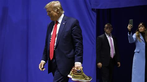 Trump Unveils New MAGA Merch at Sneaker Con—Gold Sneakers and Perfume