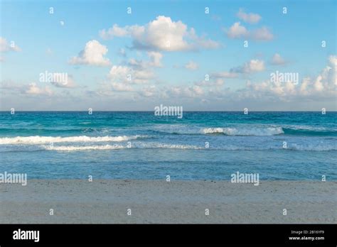 Ocean waves with turquoise water during sunset at Cancun, Yucatan ...