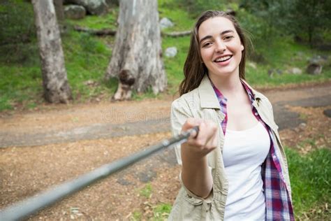 Smiling Woman Taking Selfies Stock Photo - Image of cheerful, environment: 68298832