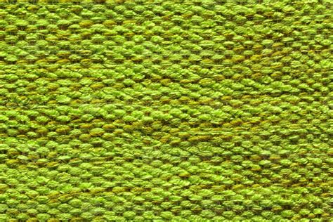 Woven green wool fabric texture. Hand knitted textile canvas background ...