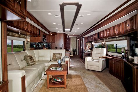 The interior of the 2011 Winnebago Tour. Look at all the woodwork! | Winnebago, Winnebago minnie ...