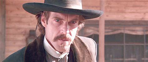 Dennis Quaid as Doc Holliday at the OK Corral in Wyatt Earp (1994) | Once Upon a Time in a Western