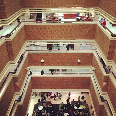 an overhead view of people walking around in a building with high ...