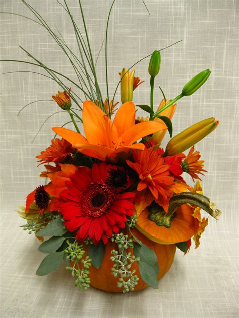 Fall wedding centerpiece inside a fresh sugar pumpkin. | Fall wedding flowers, Fresh flowers ...