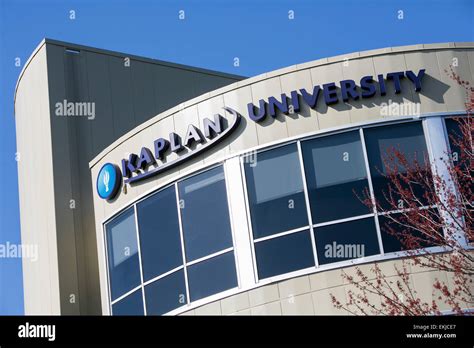 A logo sign on a building occupied by Kaplan University Stock Photo - Alamy