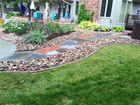 Flagstone Pathway with River Rock edging - TJN Enterprises Inc.