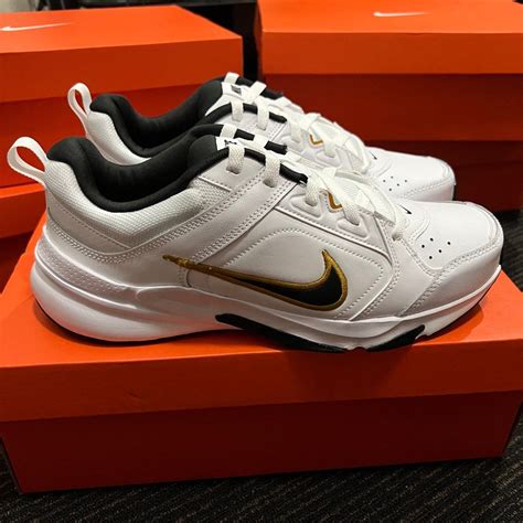 Nike Defy All Day (White/Black/Gold), Men's Fashion, Footwear, Sneakers on Carousell