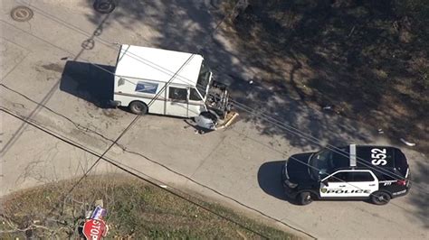 Post office truck crash: SkyEye video shows postal vehicle damaged after being involved in north ...