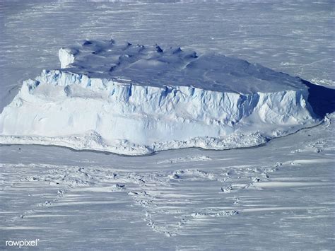 An iceberg trapped in sea ice in the Amundsen Sea. Original from NASA. Digitally enhanced by ...