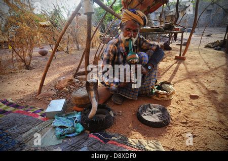 A Madari snake charmer Stock Photo - Alamy