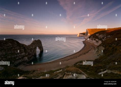 Durdle Door Sunrise at Dawn Stock Photo - Alamy