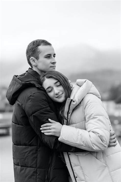 Black and White Photo of a Hugging Couple · Free Stock Photo