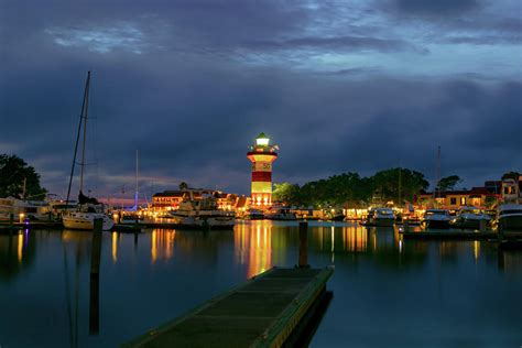 Harbor Town Lighthouse Sunset Photograph by Norma Brandsberg - Pixels