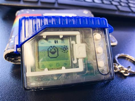 Found a new case for the Digimon Tamagotchi and started up my clear V1 ...