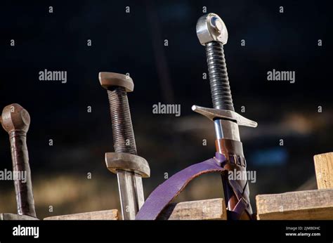Replicas of medieval swords for historical reenactments Stock Photo - Alamy