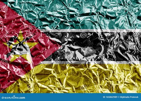 Mozambique Flag Depicted in Paint Colors on Shiny Crumpled Aluminium ...