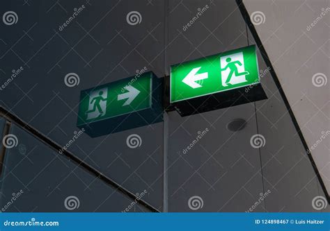 Green emergency exit sign stock image. Image of ceiling - 124898467