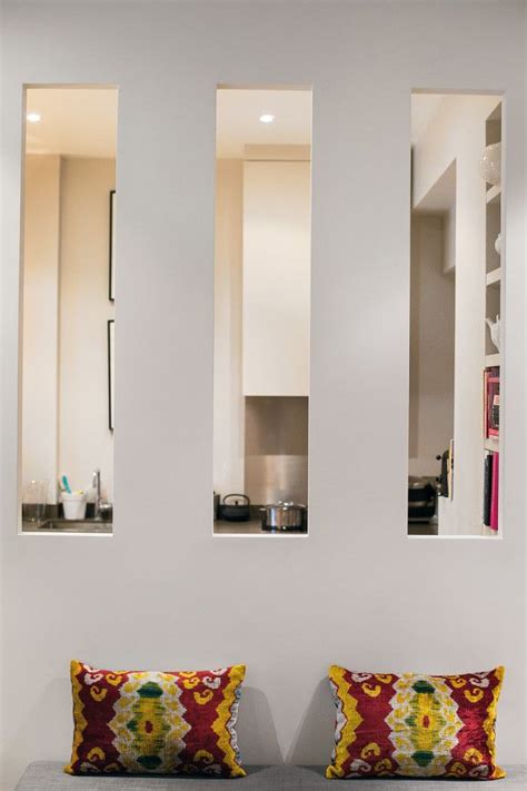 A retro-inspired Parisian apartment – openings in the partition wall are a perfect way to let in ...