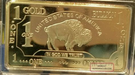 1 Troy Ounce Gold Buffalo Bar 100 Mills Clad. 999 24k Fine Bullion Bar.