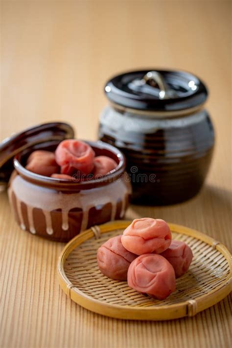 Umeboshi. Japanese Salt Plums and Umeboshi Jar. Traditional Japanese Food. Stock Image - Image ...